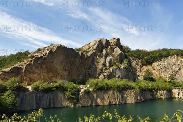 Impressive rock formations, opal lake in the granite quarry, MoselleÃ¸kken Stenbrudsmuseum, museum in the quarry, Hammerknuden, Allinge-Sandvig, Bornholm, Denmark
