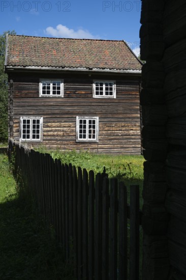 Wooden house on a historic farm, Maihaugen open-air museum with houses and objects from farms in Gudbrandsdal, Lillehammer on Lake MjÃ¸sa, Innlandet Municipality, Norway