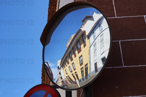 Architecture reflected distorted in a convex street mirror, UNESCO World Heritage Old Town of San Crstobal de La Laguna, La Laguna, Tenerife, Canary Islands, Spain