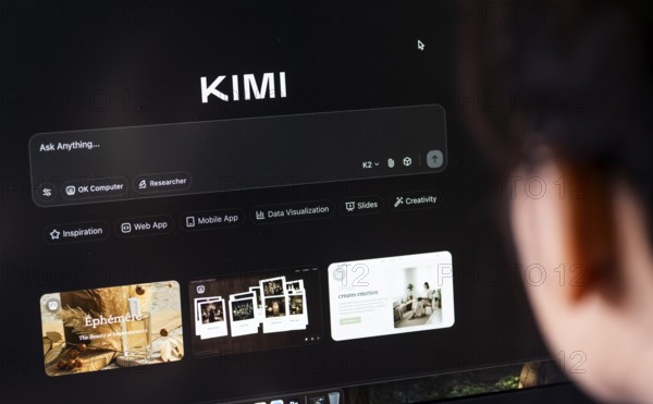 In this photo illustration, a person uses the Kimi AI chatbot on a computer, in New Delhi, India on 20 November 2025. Kimi AI is a Chinese artificial intelligence chatbot and assistant developed by Moonshot AI, a fast-growing tech company in China