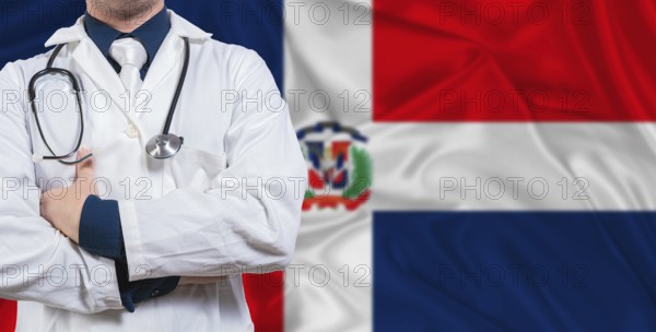 Male doctor with stethoscope on Dominican Republic flag. Doctor holding stethoscope on Dominican Republic flag