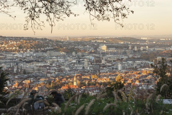 View of the city center in warm sunset light from Santiago de Chile Platz Stuttgart, Germany