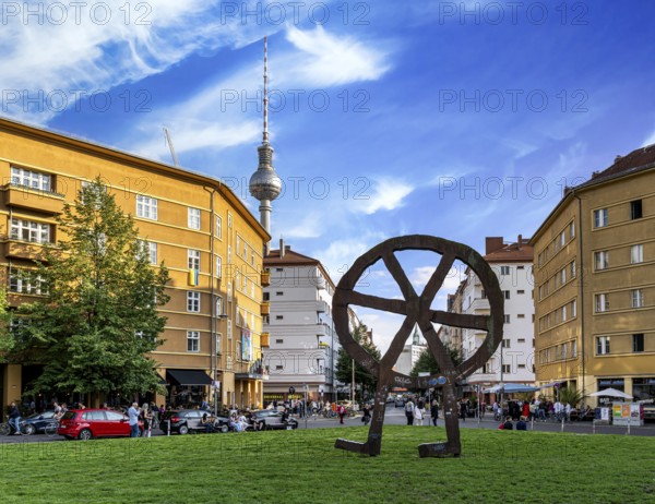 The Robber Wheel, metal sculpture and logo of VolksbÃ¼hen Berlin, made in 1994 by Swiss sculptor Rainer HauÃŸmann, Rosa Luxemburg Platz, Berlin, Germany
