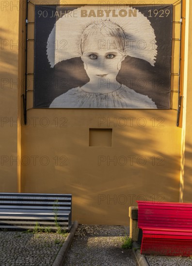 Film posters at the cult cinema Babylon on Rosa Luxemburg Platz, arthouse cinema opened in 1929, some of whose films are accompanied by a live orchestra, Berlin, Germany