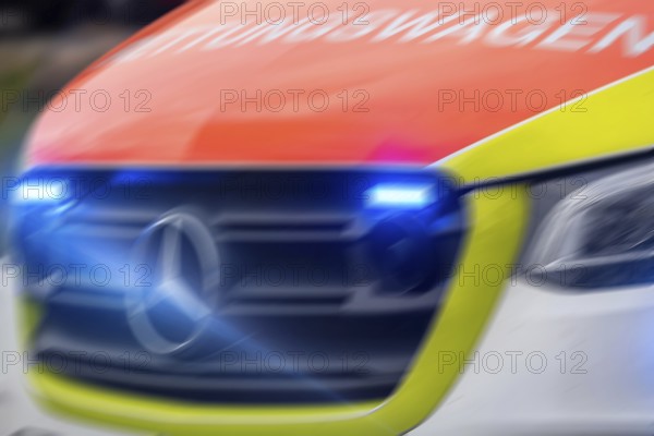 Close-up of an ambulance in action (digitally reworked)