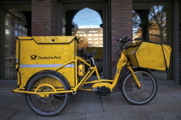 DHL, e-tricycle, e-trike, bicycle for mail deliverers, logo, parks in pedestrian zone, Free and Hanseatic City of Hamburg, Germany