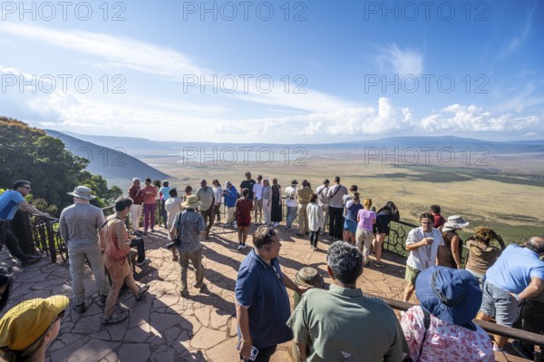Tourists on the Crater Viewpoint observation deck, view of Ngorongoro Crater, Ngorongoro Conservation Area, Tanzania