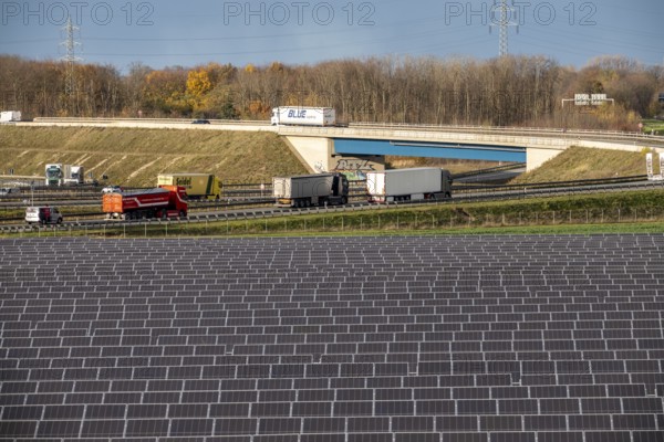 86.5 MW peak open-air photovoltaic systems, from RWE, with over 141, 000 solar modules, on a side strip, along the A44 motorway near JÃ¼chen, at Dreieck Holz, recultivated open-cast mining site, North Rhine-Westphalia, Germany