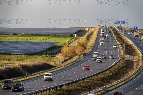 86.5 MW peak open-air photovoltaic systems, from RWE, with over 141, 000 solar modules, on a side strip, along the A44 motorway near Bedburg, at the Jackerath triangle, recultivated open-cast mining site, North Rhine-Westphalia, Germany