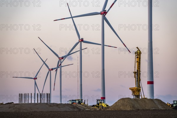 Construction site of the new Bedburg 3 wind farm, on recultivated open-cast mining site, 9 wind power plants with an output of 60 megawatts are being built, finished foundation on which the wind turbine tower is then built, operated by RWE and the city of Bedburg, North Rhine-Westphalia, Germany