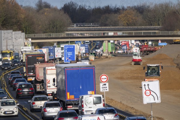 Motorway construction site, the A57 is extended to 6 lanes on the section between the Meerbusch interchange and the Oppum junction, traffic runs parallel to 2 narrowed lanes, Krefeld, North Rhine-Westphalia, Germany