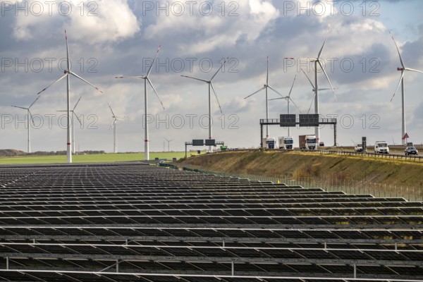 86.5 MW peak open-air photovoltaic systems, from RWE, with over 141, 000 solar modules, on a side strip, along the A44 motorway near JÃ¼chen, at Dreieck Holz, recultivated open-cast mining site, Königshovener Höhe onshore wind farm, operated by RWE and the city of Bedburg, North Rhine-Westphalia, Germany