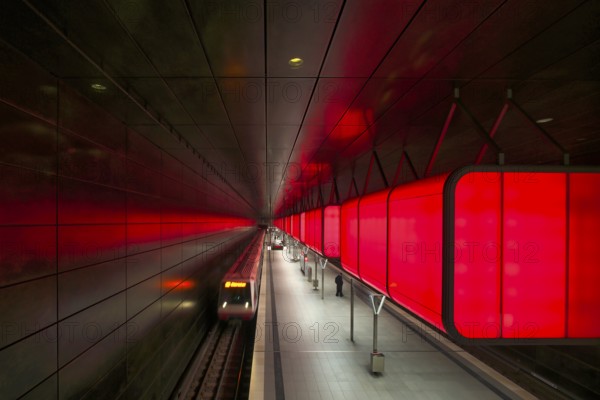 HafenCity University subway station, illuminated in color, red, underground train, movement effect, U4, travelers, platform, stop, train station, subway, public transport, HVV, Hamburger Verkehrsverbund, Hochbahn, public transport, Free and Hanseatic City of Hamburg, Germany