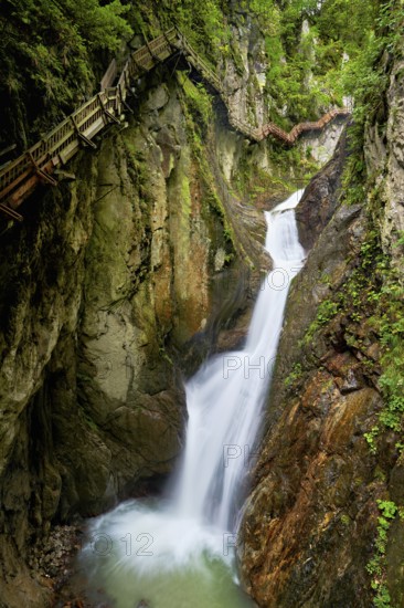 Wooden walkway next to waterfall in the Durnand Gorge, Les Valettes, Canton of Valais, Switzerland