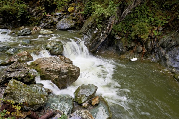 Small waterfall, Diosaz mountain river in the gorge, Gorges de la Diosaz, Les Houches, Chamonix-Mont-Blanc, Haute-Savoie, France
