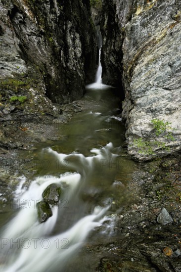 Small waterfall, Diosaz mountain river in the gorge, Gorges de la Diosaz, Les Houches, Chamonix-Mont-Blanc, Haute-Savoie, France
