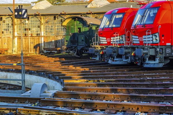Modern locomotives of the Austrian Federal Railways, Ã–BB, and Deutsche Bahn, DB, historic railroad car, parked in front of the old lock shed, Augsburg railway park, administrative district of Swabia, Bavaria, Germany