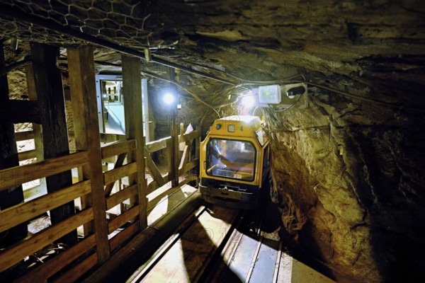 Yellow passenger subway in a tunnel in a salt mine, salt mine, Bex, Canton of Vaud, Switzerland