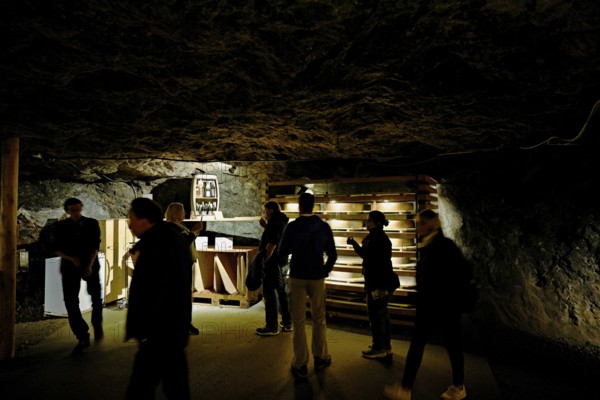 People in an ancient tunnel in a salt mine, salt mine, Bex, Canton of Vaud, Switzerland