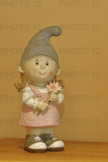 Kermamic figure, girl with flower, Wilnsdorf, North Rhine-Westphalia, Germany