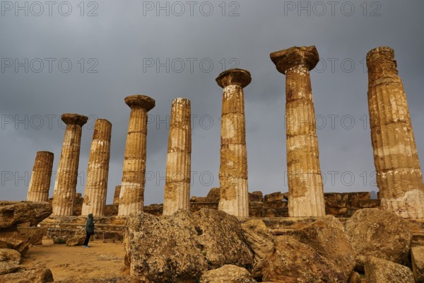 Temple of Heracles, Ancient Pillars of an Ancient Ruin under a Cloudy Sky, Valley of the Temples, Valle dei Templi, Archaeological Site, UNESCO World Heritage Site, Agrigento, Sicily, Italy