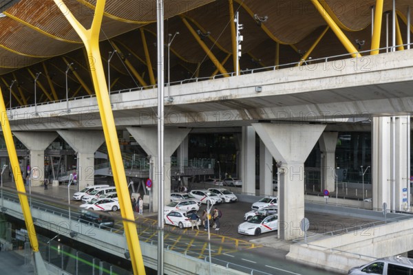 Taxis outside terminal 4 building, Adolfo SuÃ¡rez Madridâ€“Barajas airport, Madrid, Spain