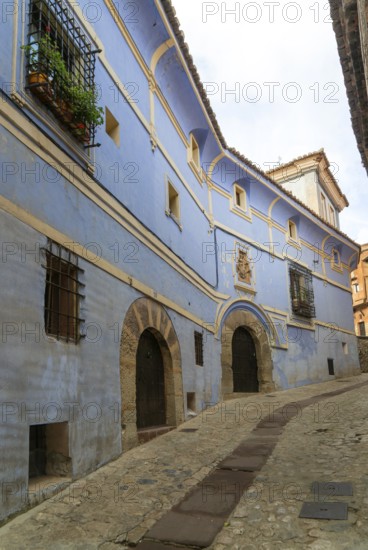 Casa de los Navarro de Arzuriaga, the Blue House, historic buildings in medieval village of AlbarracÃ­n, Teruel province, Aragon, Spain