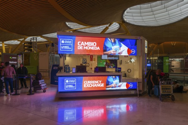 Cambio de Moneda currency exchange desk inside terminal 4 building, Adolfo SuÃ¡rez Madridâ€“Barajas airport, Madrid, Spain