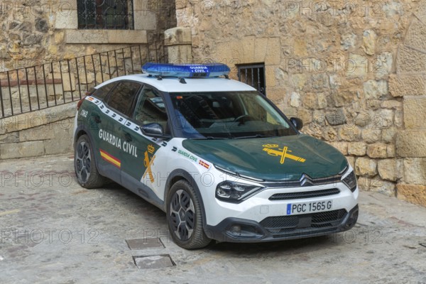Guardia Civil, Civil Guard, CitroÃ«n C4 car medieval village of AlbarracÃ­n, Teruel province, Aragon, Spain