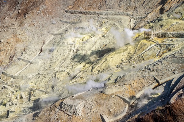 Steaming fumaroles in the ÅŒwakudani geothermal area at Komagatake volcano, Hakone, Japan