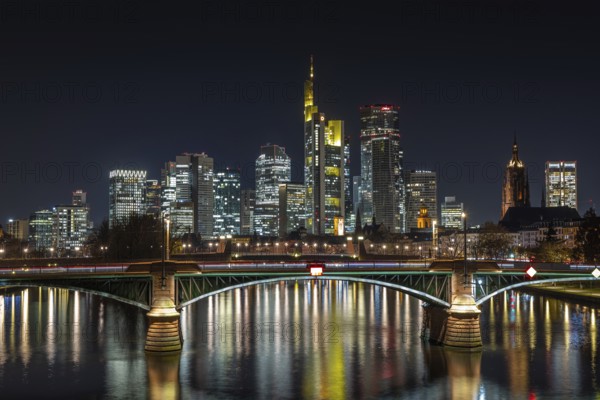 The lights of Frankfurt's banking skyline glow in the evening, Frankfurt am Main, Hesse, Germany