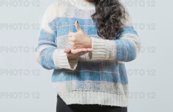 Close up of hands gesturing help in nonverbal language. Hands showing HELP gesture with hands in sign language