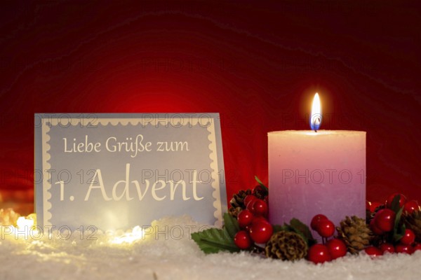 Greetings for the 1st Advent: Greeting card with the inscription GREETINGS FOR THE 1ST ADVENT next to a candle (digitally reworked)