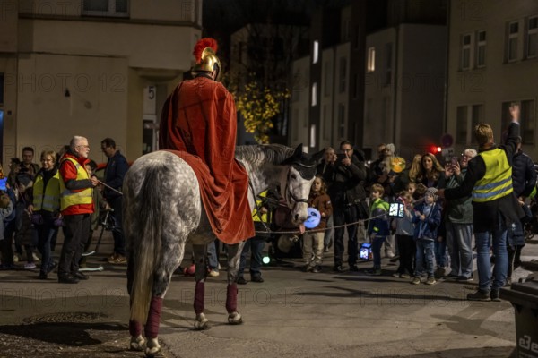 Martinszug in Essen-RÃ¼ttenscheid, the parish of St. Lambertus, Saint Martin actor on a horse, with over 500 participants, North Rhine-Westphalia, Germany