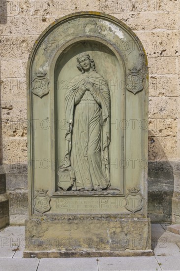 Old gravestone in front of St Martin's Church, catholic church, graceful female figure, relief, stone, dress with drapery, Dotternhausen, Zollernalbkreis, Baden-Württemberg, Germany