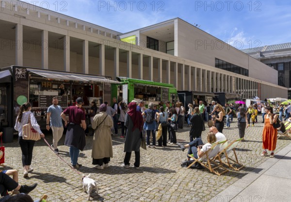 Fast food stalls in the courtyard of the James Simon Gallery, Berlin, Germany