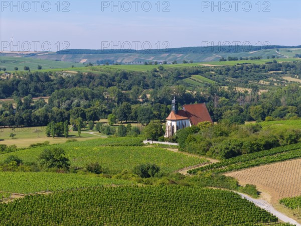 Pilgrimage church Maria im Weingarten, embedded in a green, rural landscape with blue sky, aerial view, near Volkach am Main, Lower Franconia, Mainfranken, Bavaria, Germany