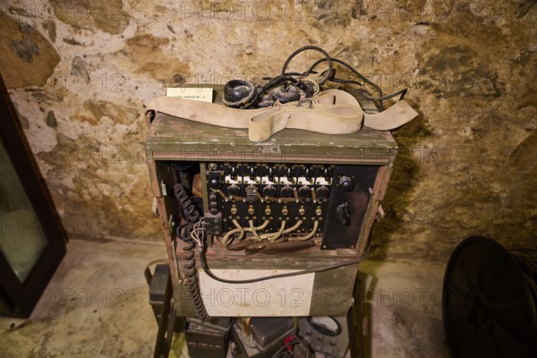 Old telephone in a wooden box with cables, in historical surroundings, war museum, military museum, tunnel museum, Lakki, Leros, WW2, Dodecanese, Greek Islands, Greece