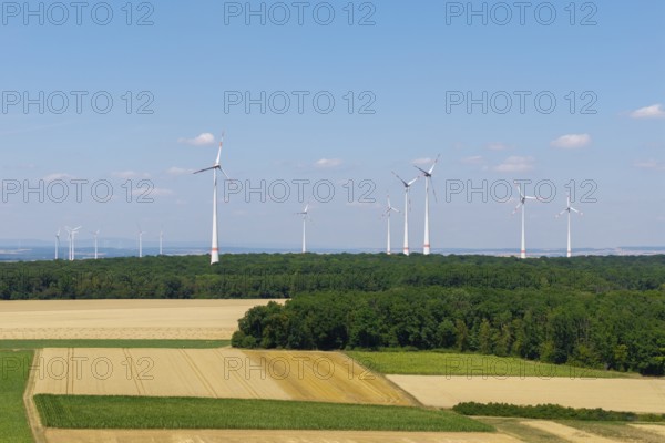 Landscape with several wind turbines on a large, open field under a blue sky, near Volkach, aerial view, Mainfranken, Mainschleife, Franconia, Lower Franconia, Bavaria, Germany