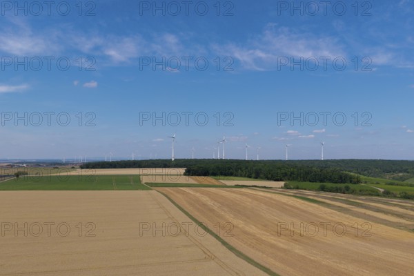 Wide fields with a wind farm on the horizon, under a clear blue sky, near Volkach, aerial view, Mainfranken, Mainschleife, Franconia, Lower Franconia, Bavaria, Germany