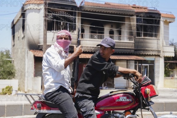 Sectarian violence in the Syrian city of Sweida between Druze factions loyal to Sheikh Hikmat al-Hijri and Bedouin tribes, as Syrian government forces attempt to intervene to end the conflict and restore security to the city