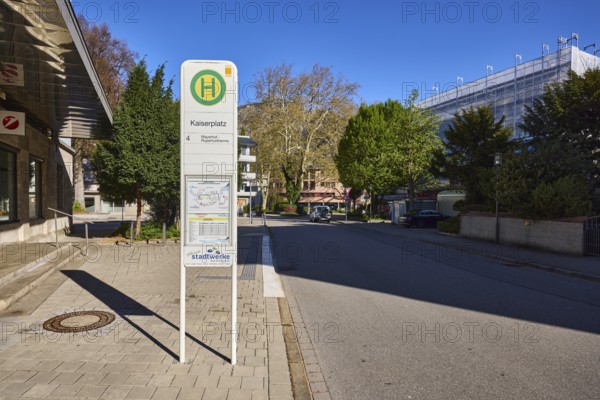 Bus stop Kaiserplatz, building, pavement, paving slabs, blue sky, cloudless, street, Bahnhofstraße, Bad Reichenhall, district Berchtesgadener Land, Bavaria, Germany