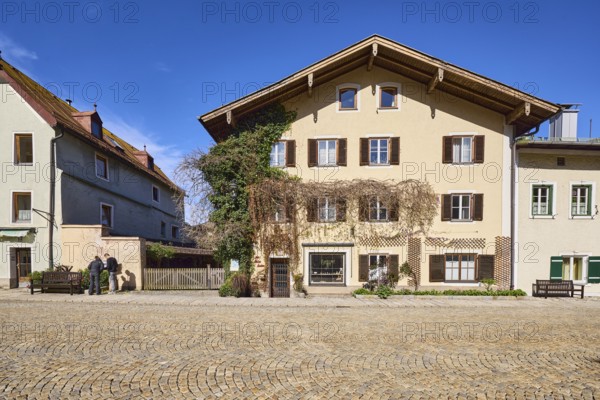 Historic houses, facade, window, door, shutters, square, cobblestones, blue sky, cirrostratus clouds, Florianiplatz, Bad Reichenhall, Berchtesgadener Land district, Bavaria, Germany