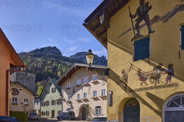 Historic buildings, square, aerial painting, food and dairy products, lantern, facade, window, mountain landscape, mountain, forest, blue sky, cirrostratus clouds, Florianiplatz, Bad Reichenhall, district Berchtesgadener Land, Bavaria, Germany