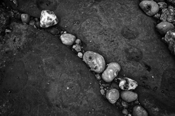 Pebbles, stones, pebbles on the beach, black and white, Yport, chalk cliffs, alabaster coast, La Côte d'Albâtre, Normandy, Seine-Maritime, France