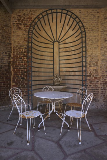 Seating area, seating group, rusty chairs, table, morbid, Maison Maurice Leblanc, museum in the garden and home of the writer known for Arsène Lupin, Étretat, Normandy, Seine-Maritime, France