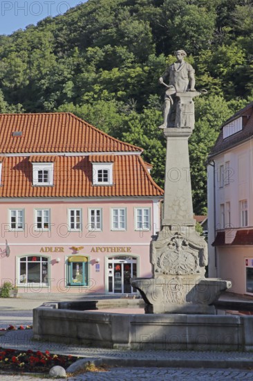 Armourer's fountain with sculpture, blacksmith at the anvil making a weapon, market square, Suhl, Franconia, Thuringia, Germany