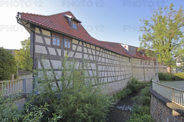 Armoury museum built in 1668, half-timbered house, rear, Lauter, stream, Suhl, Franconia, Thuringia, Germany