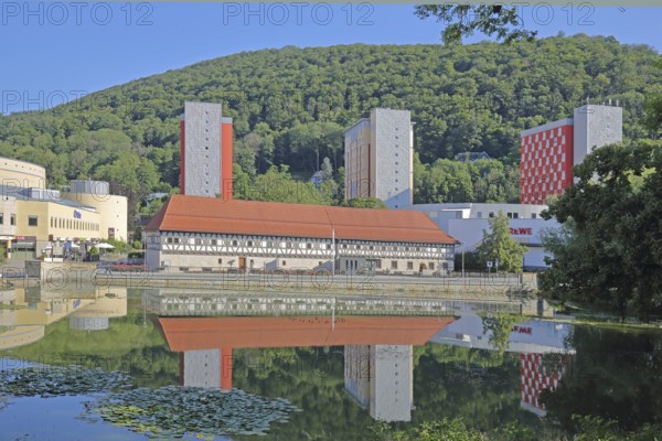 Arms museum built in 1668 with modern skyscrapers and reflection, half-timbered house, pond, congress centre, cityscape, mountain, forest, Thuringian Forest, Suhl, Franconia, Thuringia, Germany