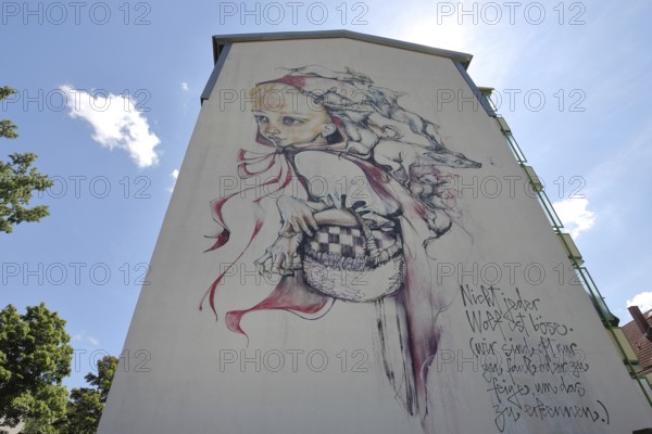 Mural Once Upon a Time by Herakut 2014, a long time ago, once upon a time, fairy tale, Little Red Riding Hood, fairy tale figure, street art, graffiti, mural, house facade, inscription, text, Schmalkalden, Franconia, Thuringia, Germany
